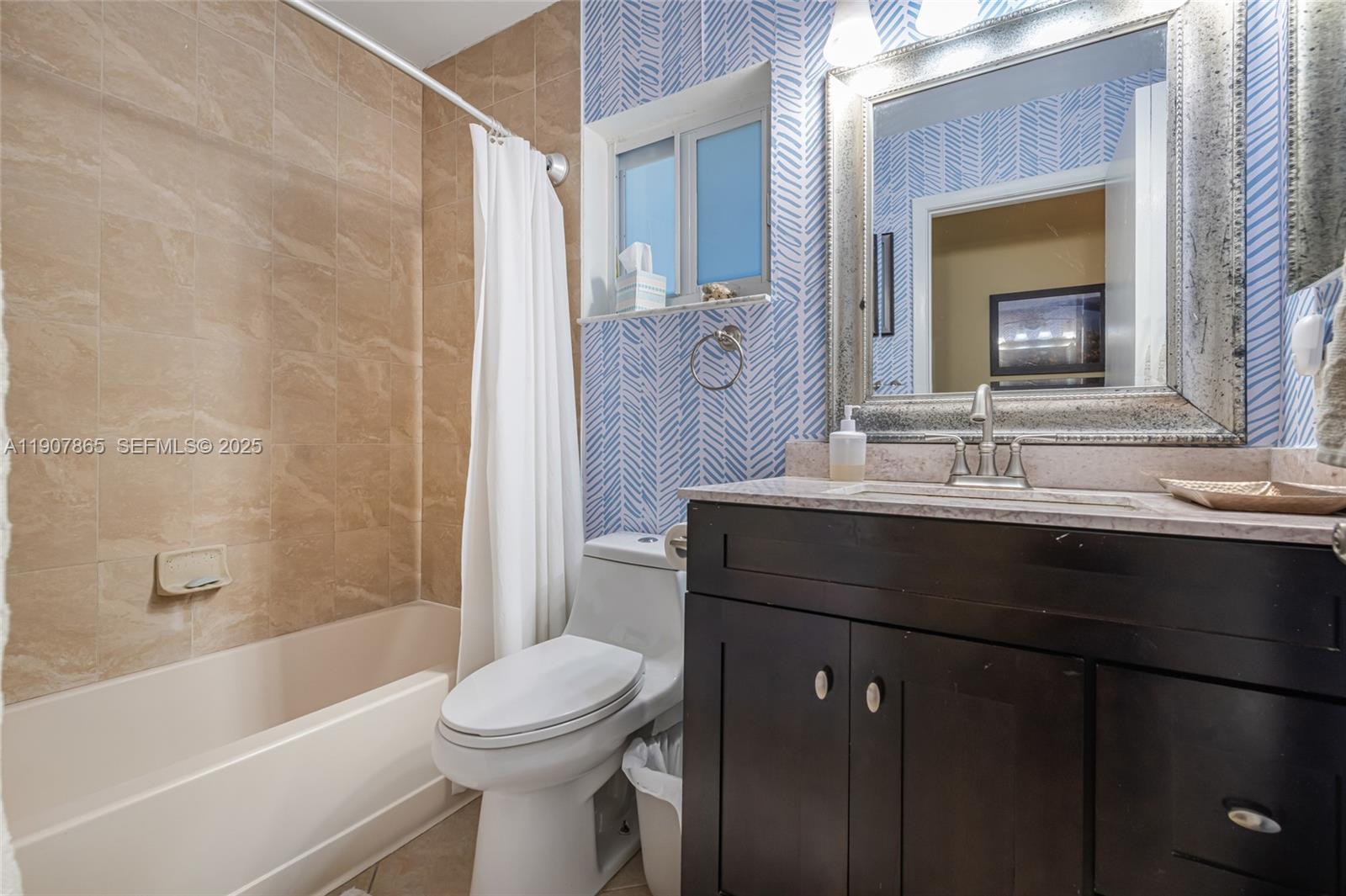 5830 North Park Road Dania Beach, FL 33312 - Photo 14 of 31 a bathroom with a sink a toilet and shower