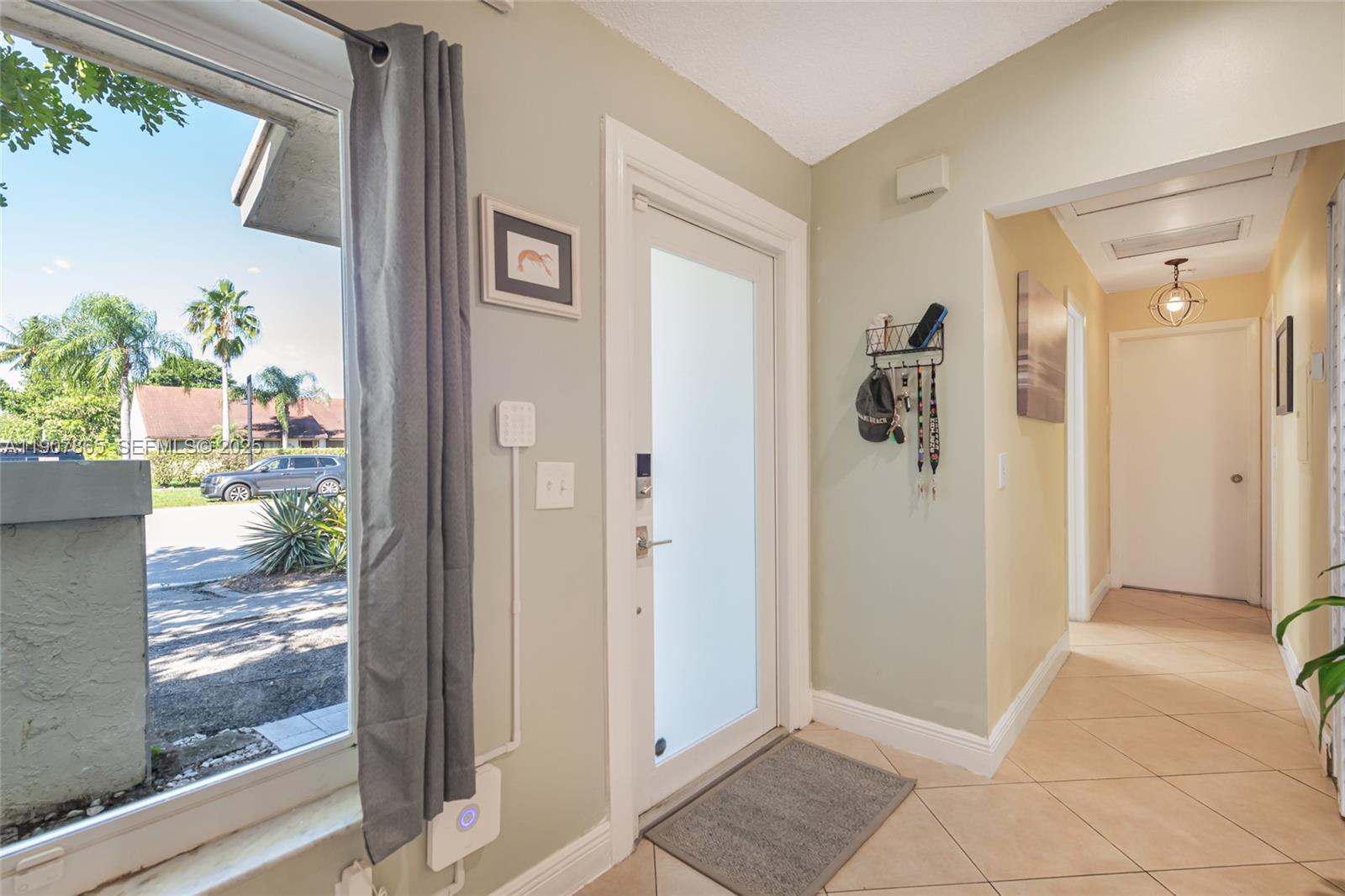 5830 North Park Road Dania Beach, FL 33312 - Photo 15 of 31 a view of a bathroom with a glass door