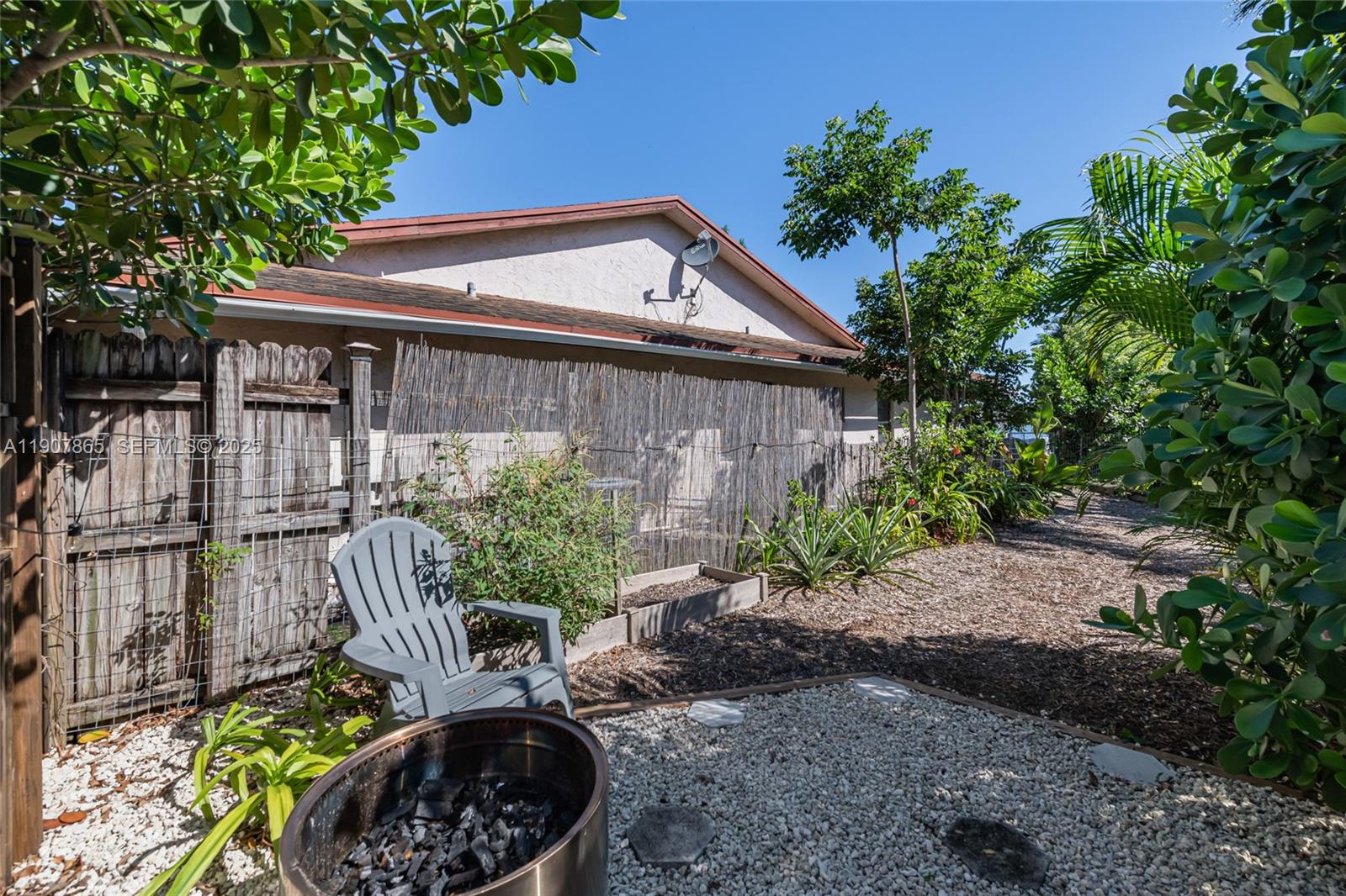 5830 North Park Road Dania Beach, FL 33312 - Photo 28 of 31 a backyard of a house with lots of green space