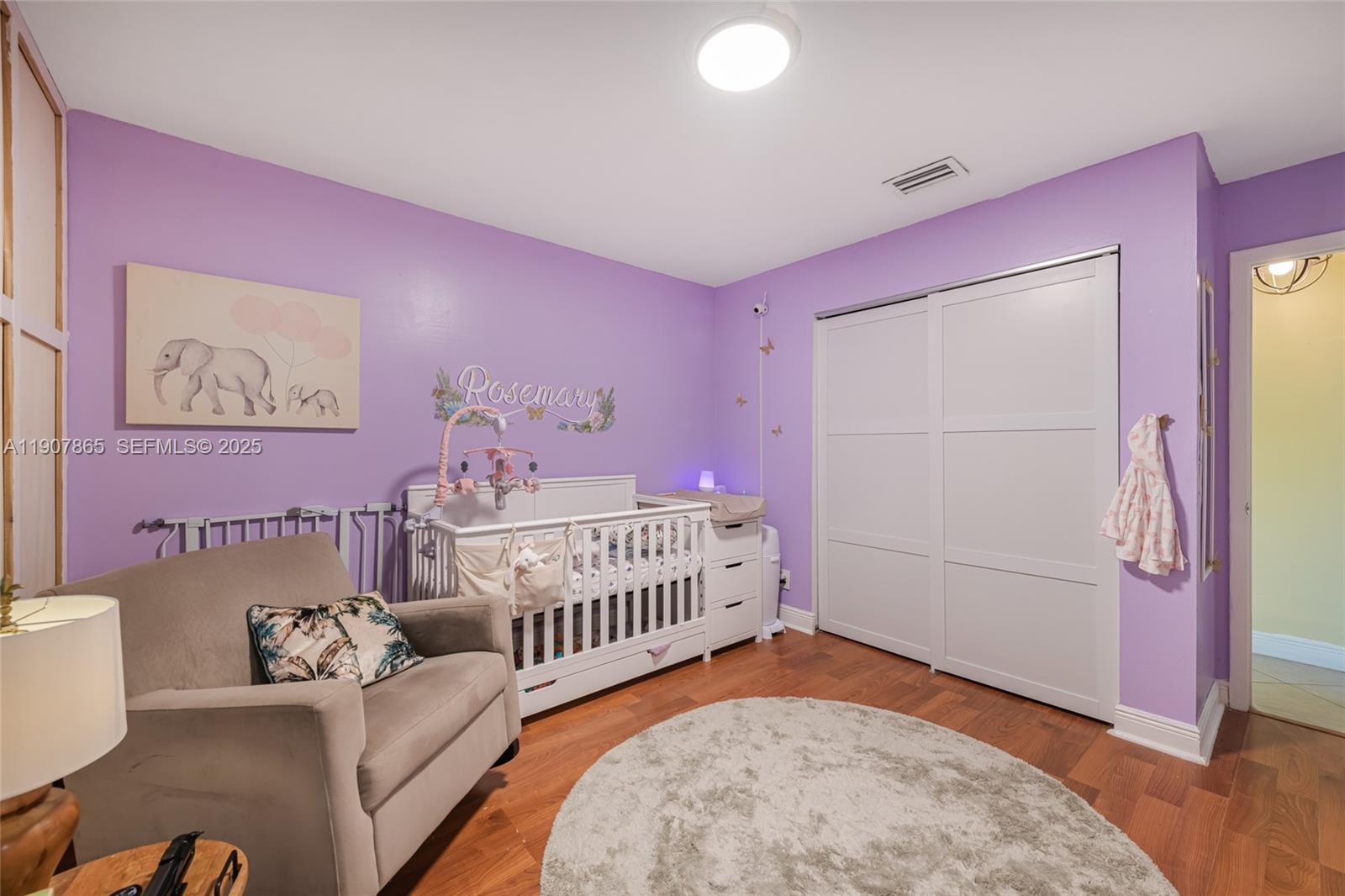 5830 North Park Road Dania Beach, FL 33312 - Photo 8 of 31 a bedroom with furniture and a wooden floor