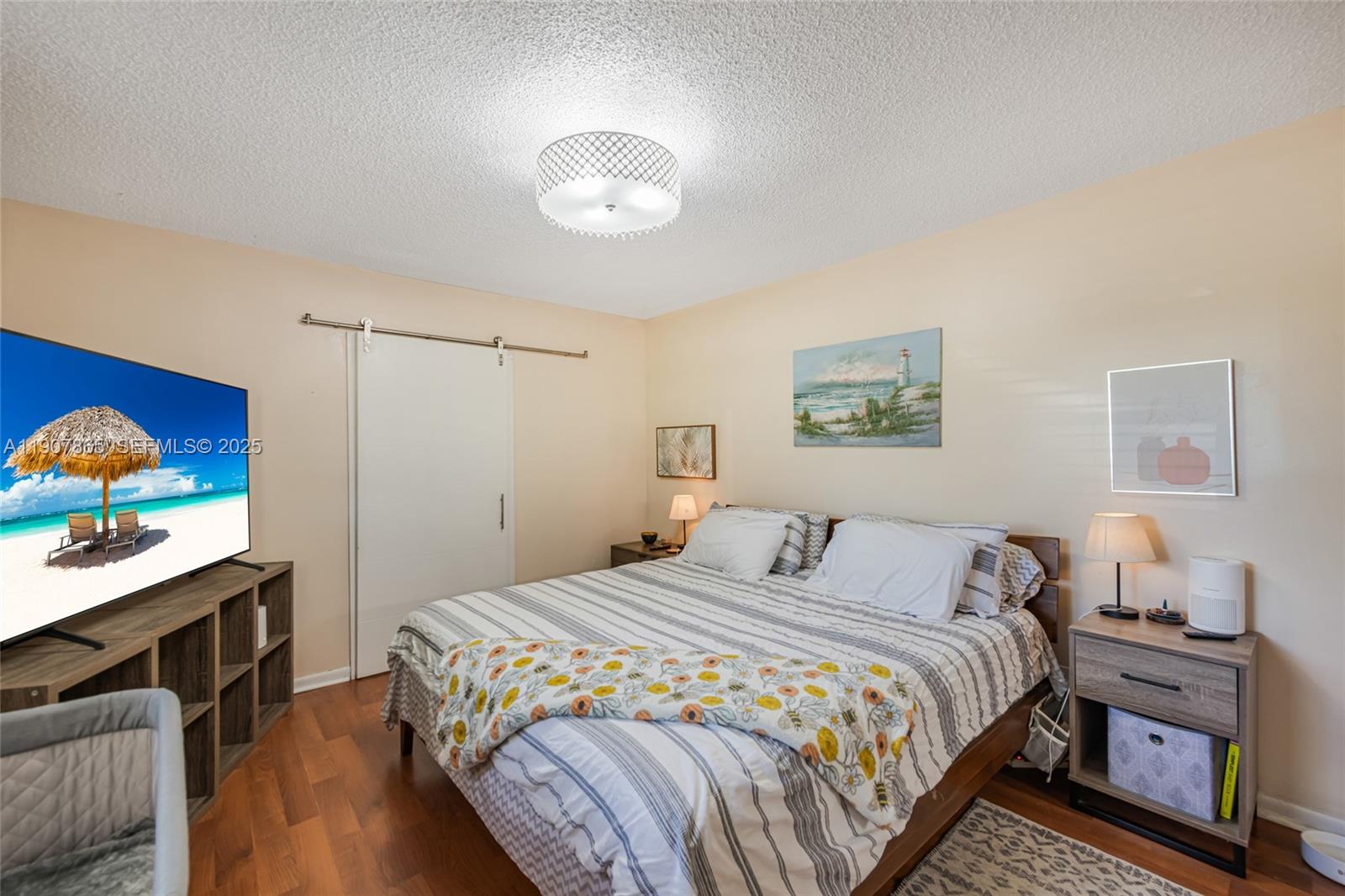 5830 North Park Road Dania Beach, FL 33312 - Photo 10 of 31 a bedroom with a bed and a desk