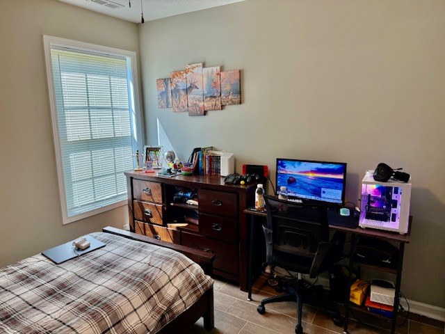 1316 Old Cowan Road Winchester, TN 37398 - Photo 8 of 23 a bedroom with a bed and a desk