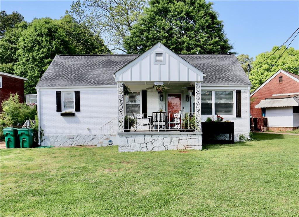 2664 McAfee Road Decatur, GA 30032 - Photo 1 of 1 a front view of a house with garden