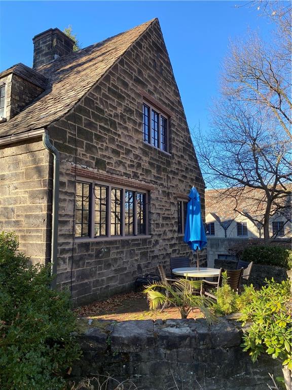 5659 Darlington Road Pittsburgh, PA 15217 - Photo 9 of 23 a view of a house with pool and chairs