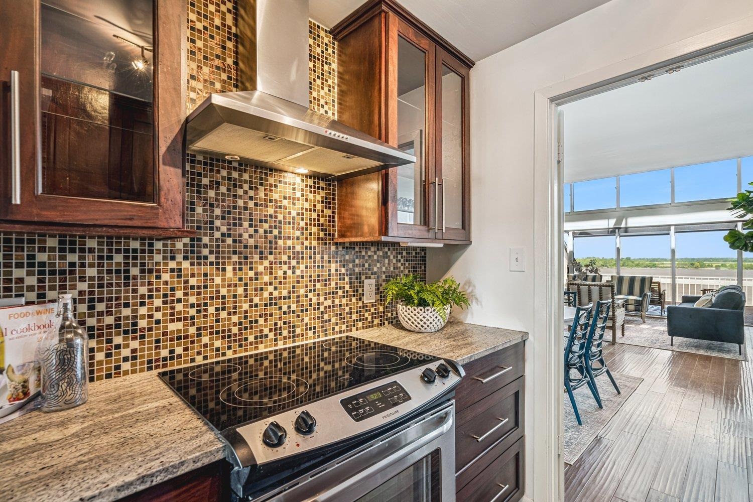 335 Riverbluff Place, Unit 3 Memphis, TN 38103 - Photo 6 of 17 a stove top oven sitting inside of a kitchen