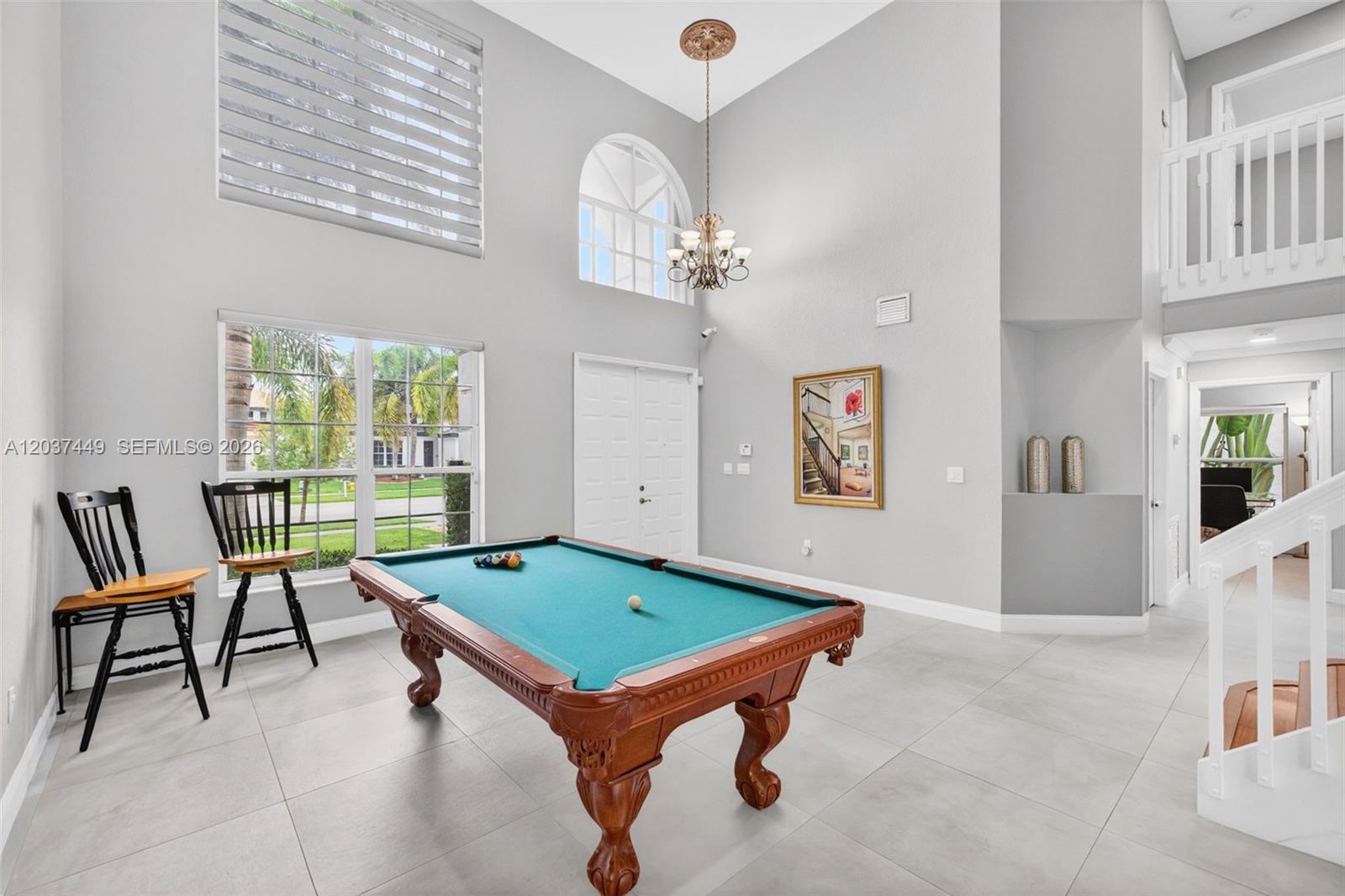 17488 Southwest 28th Court Miramar, FL 33029 - Photo 4 of 50 a room with pool table and windows