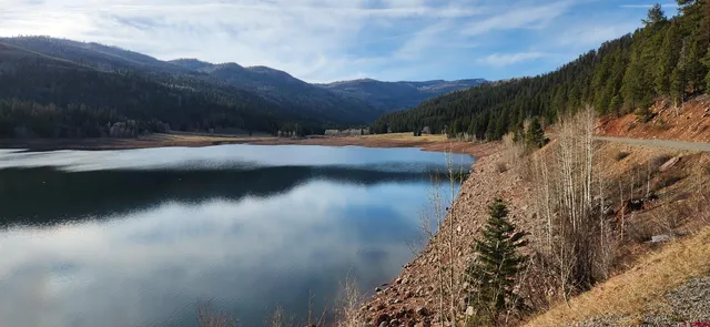 a view of a lake with a mountain in the background