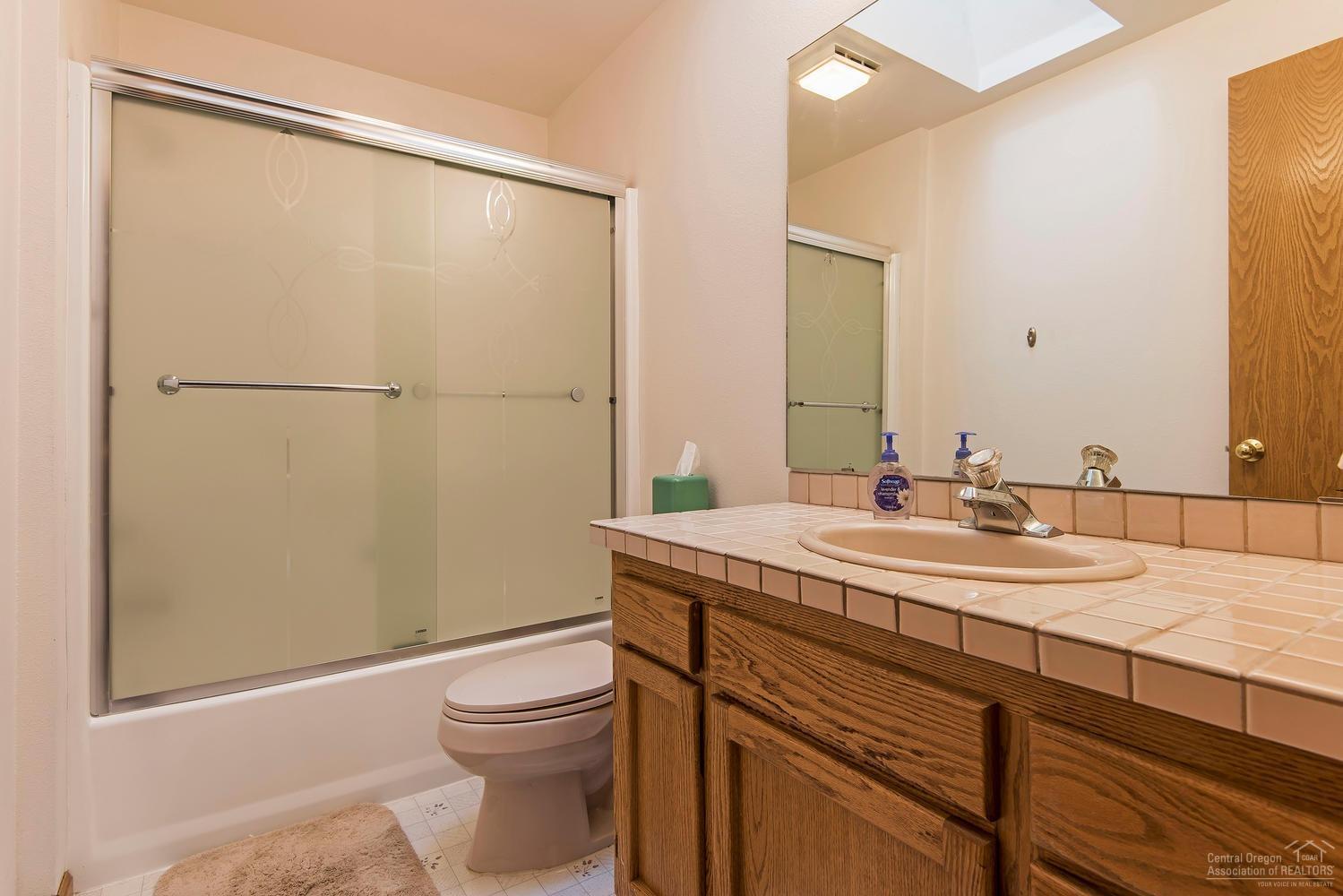 63311 Abbey Rd Bend Bend, OR 97701 - Photo 14 of 25 Upstairs hall bath serves the two guest