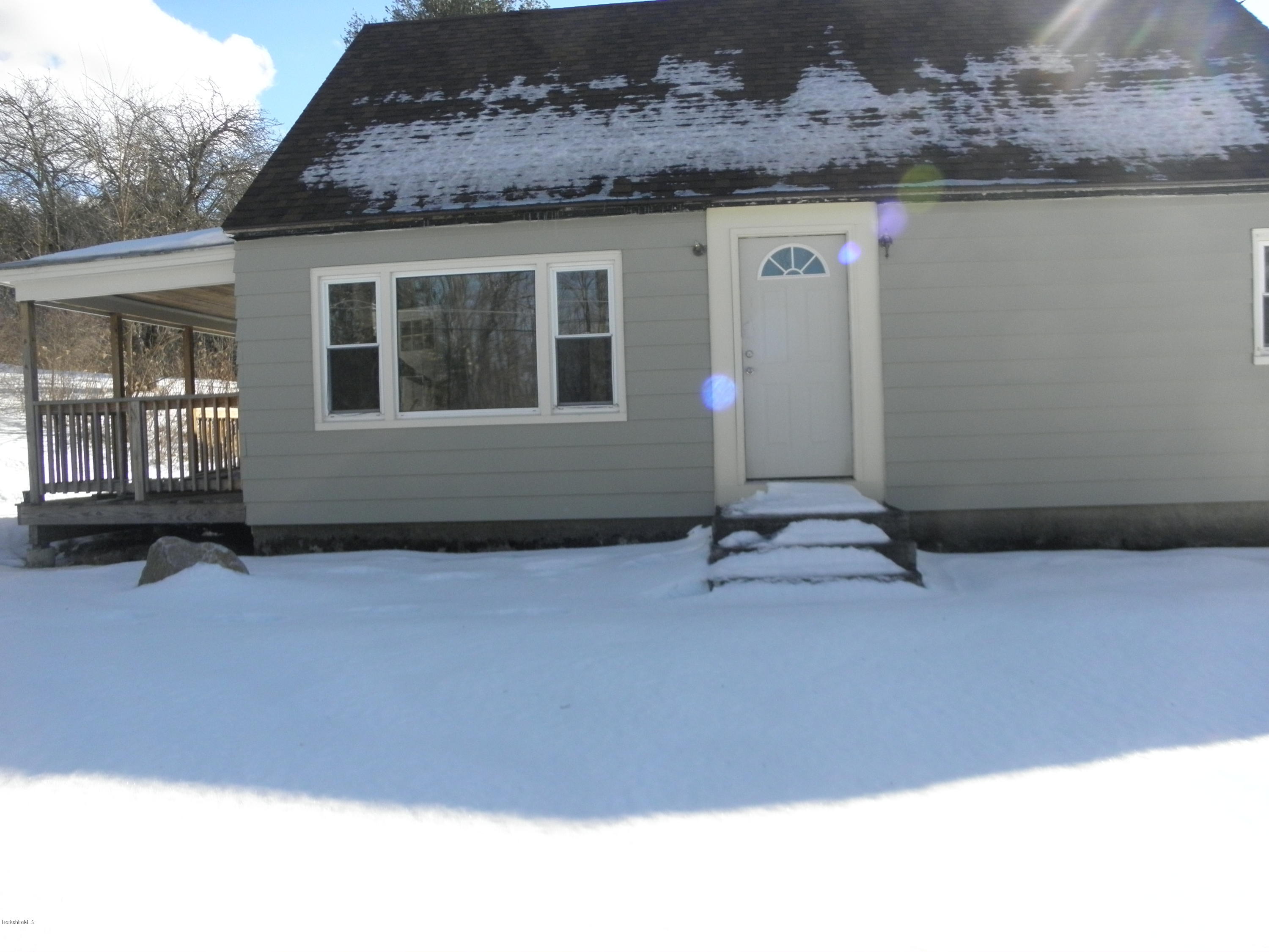 285 Cross Road Clarksburg, MA 01247 - Photo 1 of 2 a front view of a house with a yard