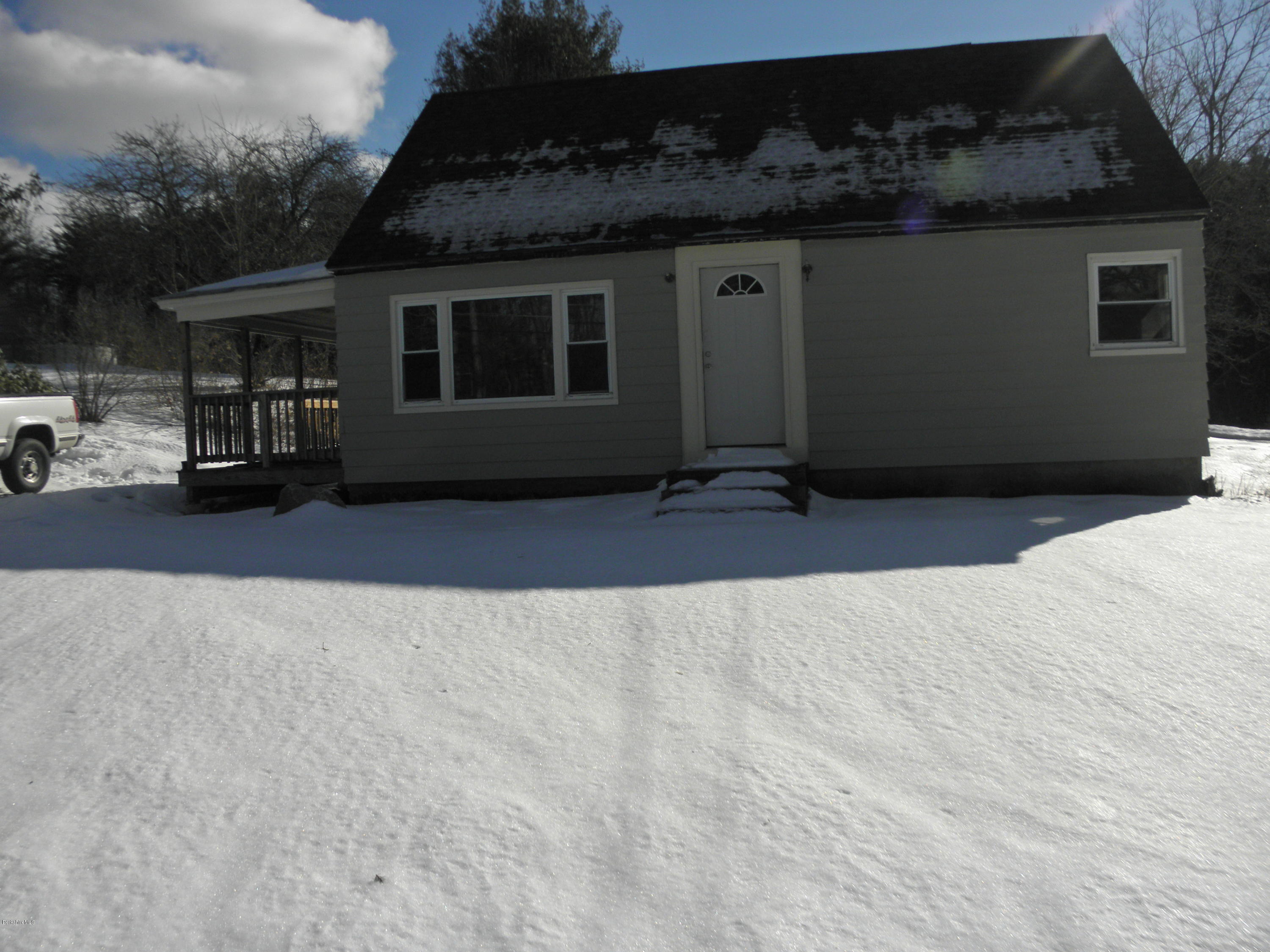 285 Cross Road Clarksburg, MA 01247 - Photo 2 of 2 a backyard of a house with yard and garage