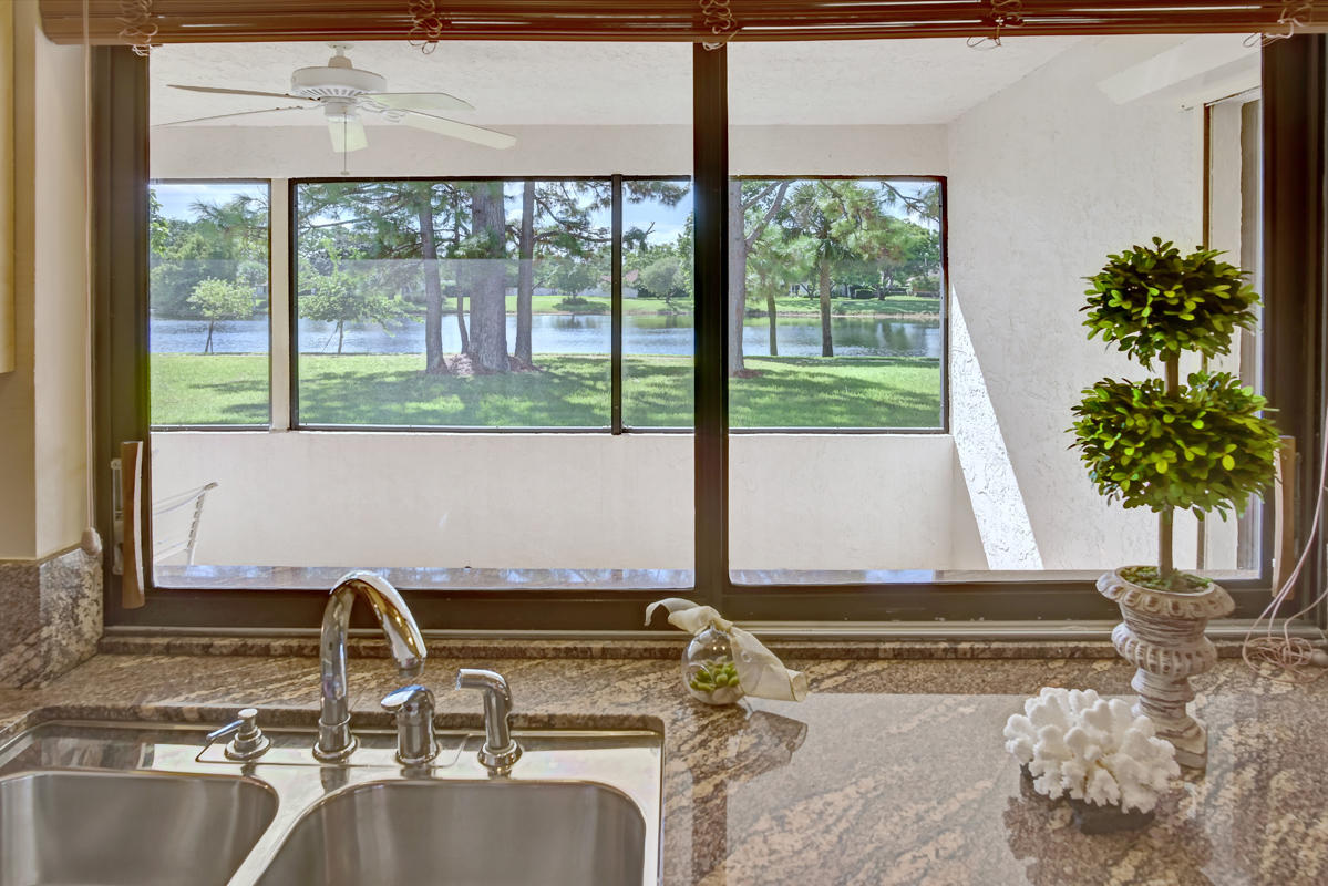 6390 Woodbury Road Boca Raton, FL 33433 - Photo 20 of 24 29- Kitchen with Lakeview
