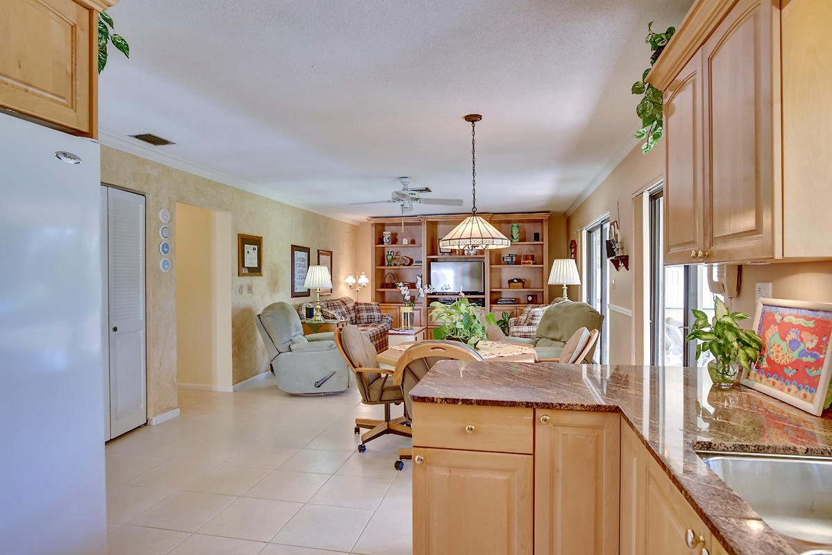 6390 Woodbury Road Boca Raton, FL 33433 - Photo 22 of 24 Open Concept Kitchen to Family Room