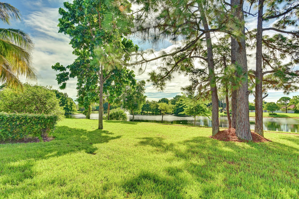 6390 Woodbury Road Boca Raton, FL 33433 - Photo 7 of 24 Backyard lakeview