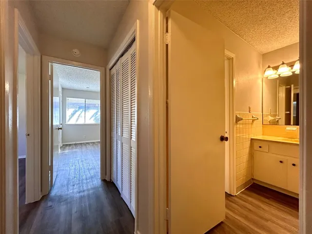 a view of a bathroom with a glass door