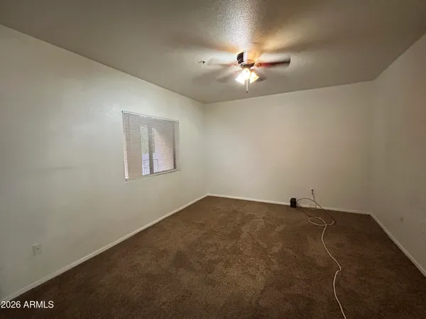 a view of a room with a fan