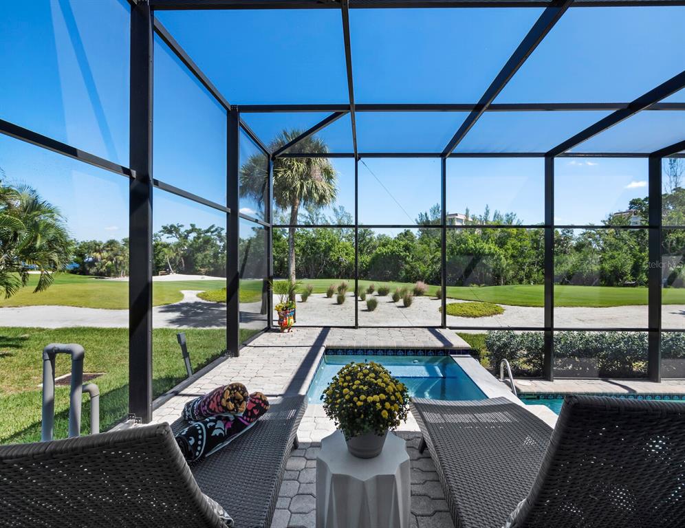 3408 Fair Oaks Lane Longboat Key, FL 34228 - Photo 20 of 76 a view of swimming pool with a patio