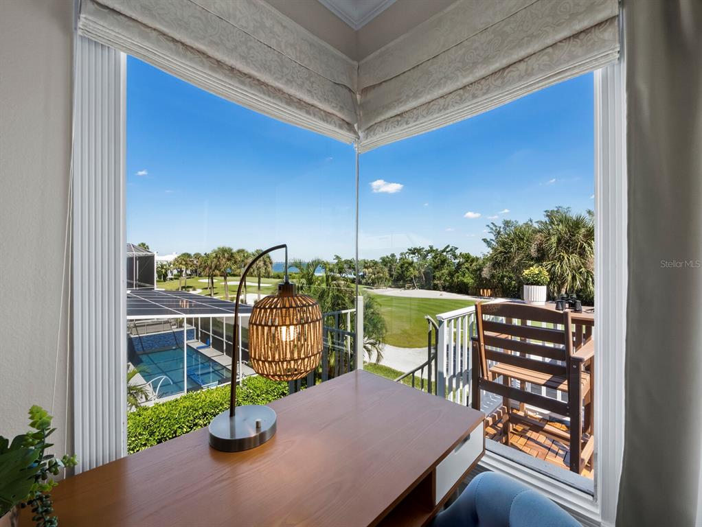 3408 Fair Oaks Lane Longboat Key, FL 34228 - Photo 43 of 76 a view of a chairs and table in the balcony