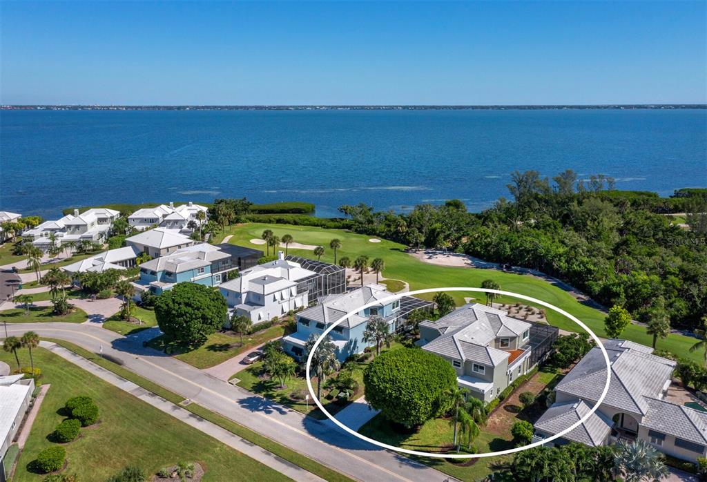 3408 Fair Oaks Lane Longboat Key, FL 34228 - Photo 55 of 76 an aerial view of residential houses with outdoor space and swimming pool