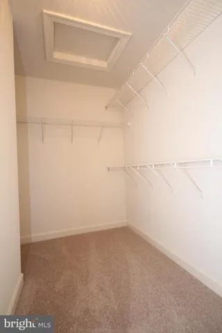 a view of a room with racks on the wall