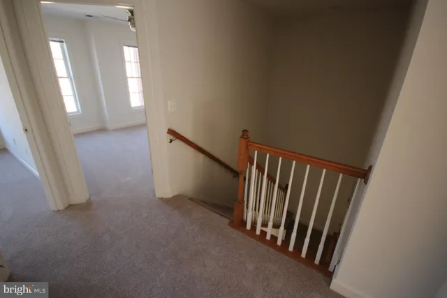 a view of a hallway with entryway