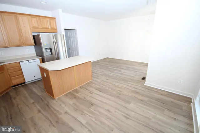 a bathroom with a sink toilet and a mirror