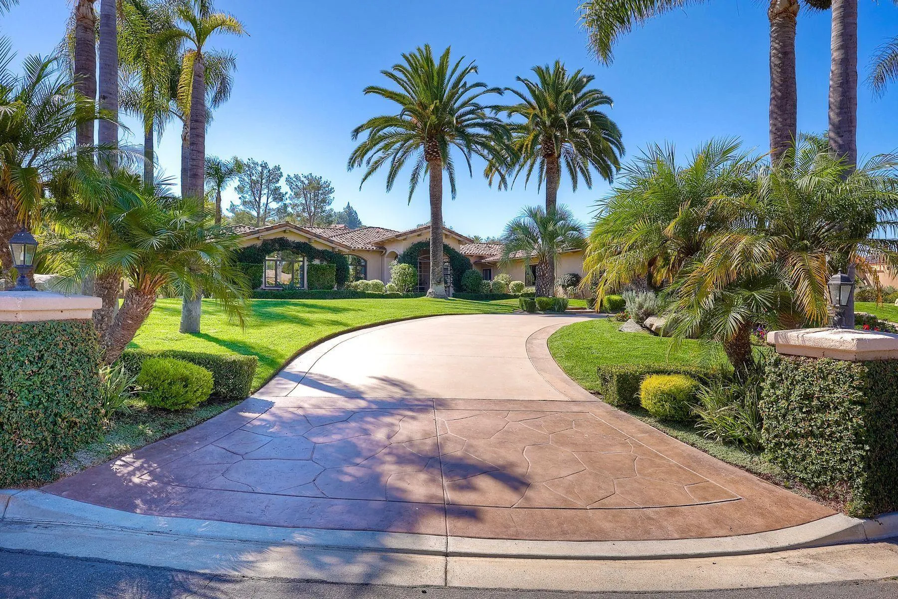 a view of backyard with swimming pool and outdoor seating