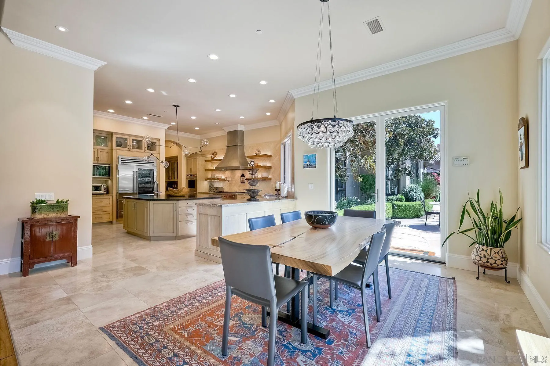 17732 Vineyard Lane Poway, CA 92064 - Photo 19 of 63 a kitchen with a table and chairs in it