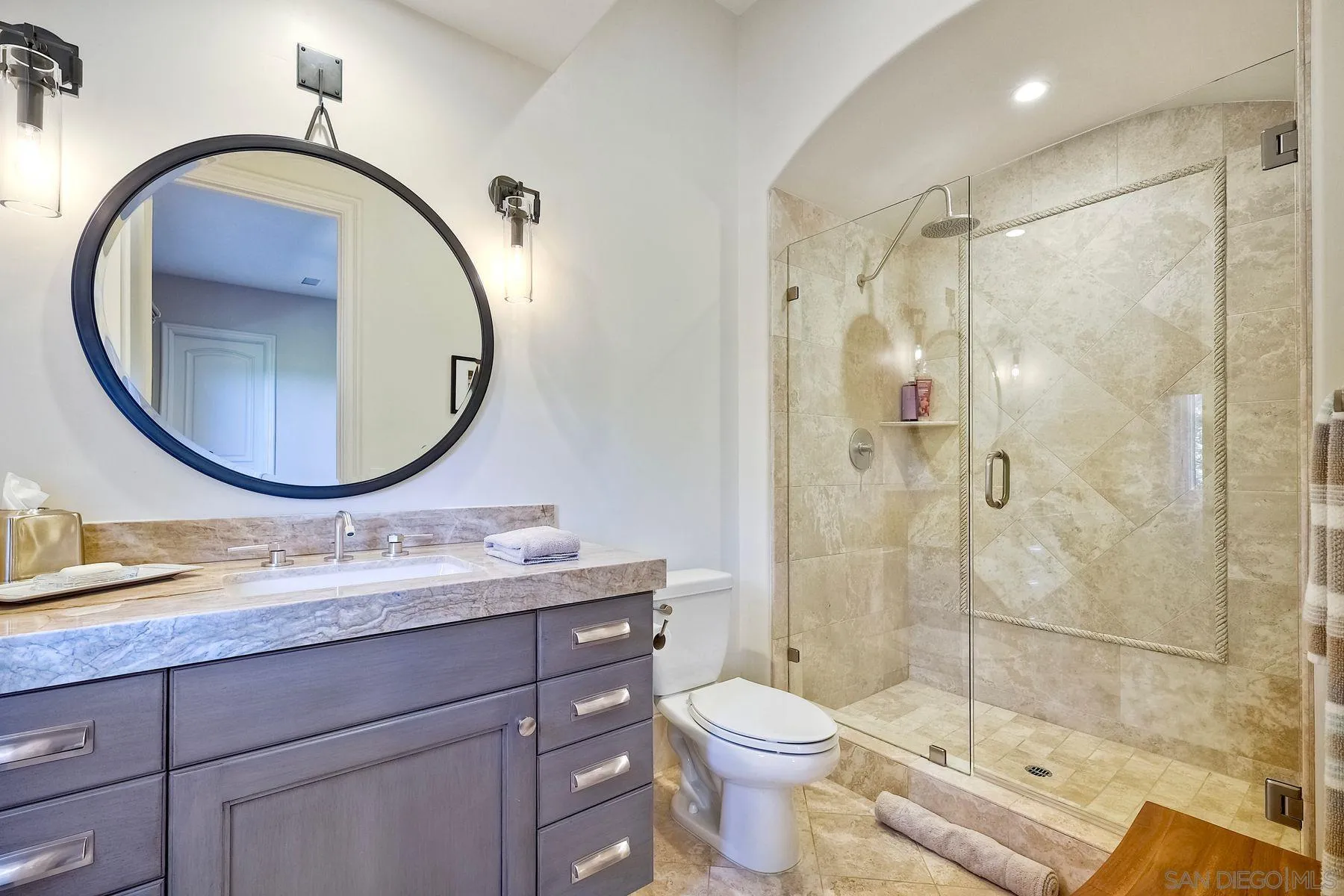 17732 Vineyard Lane Poway, CA 92064 - Photo 23 of 63 a bathroom with a toilet a sink and a mirror