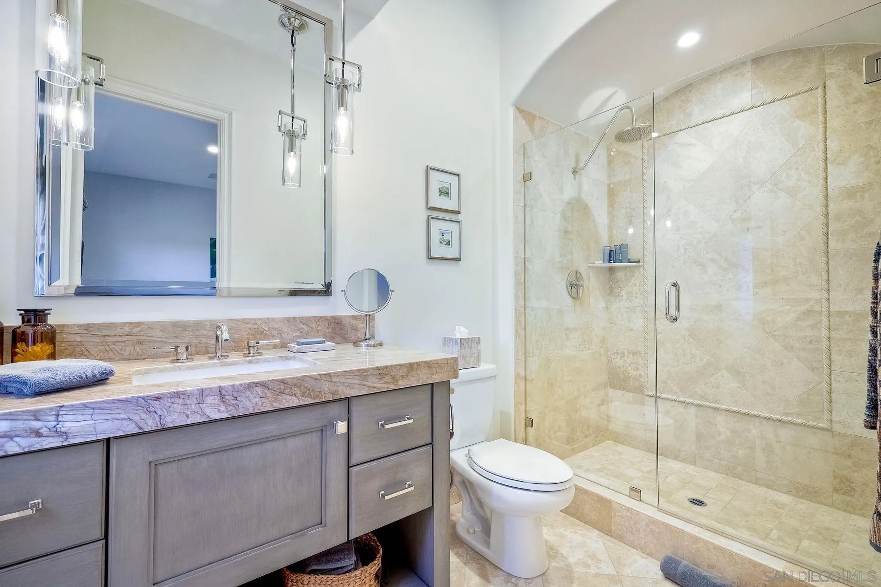 17732 Vineyard Lane Poway, CA 92064 - Photo 25 of 63 a bathroom with a granite countertop sink toilet and shower