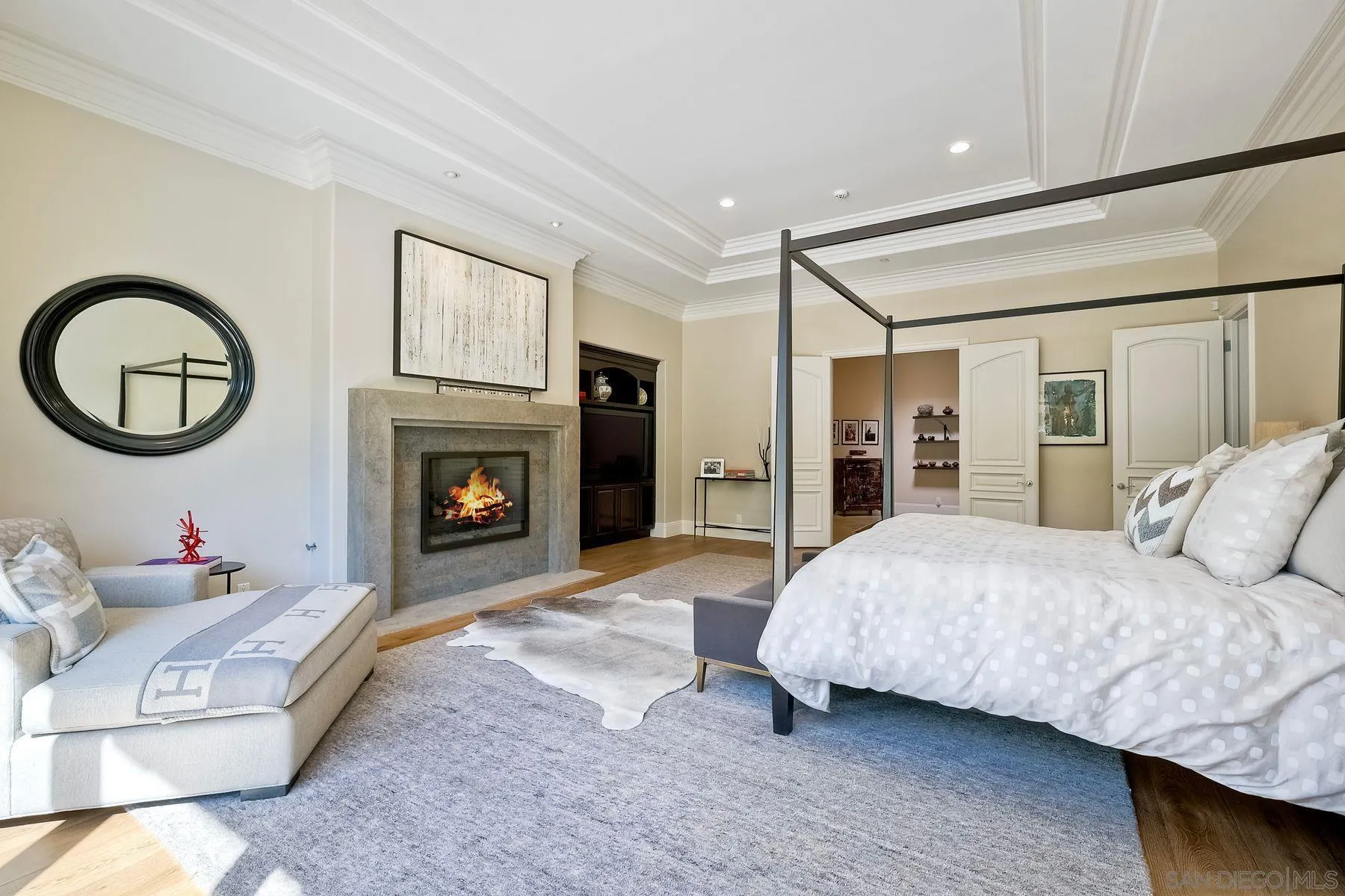 17732 Vineyard Lane Poway, CA 92064 - Photo 28 of 63 a spacious bedroom with a bed and a fireplace