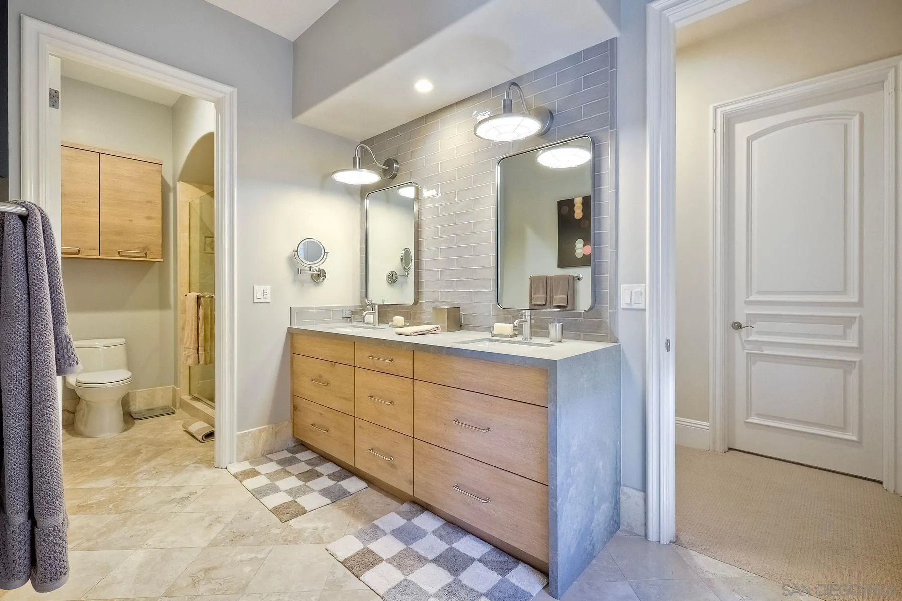 17732 Vineyard Lane Poway, CA 92064 - Photo 31 of 63 a bathroom with a granite countertop sink mirror and a toilet