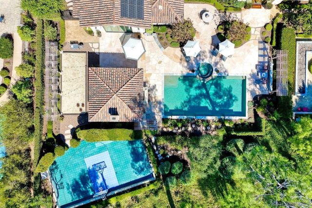 a bedroom with furniture and a flat screen tv
