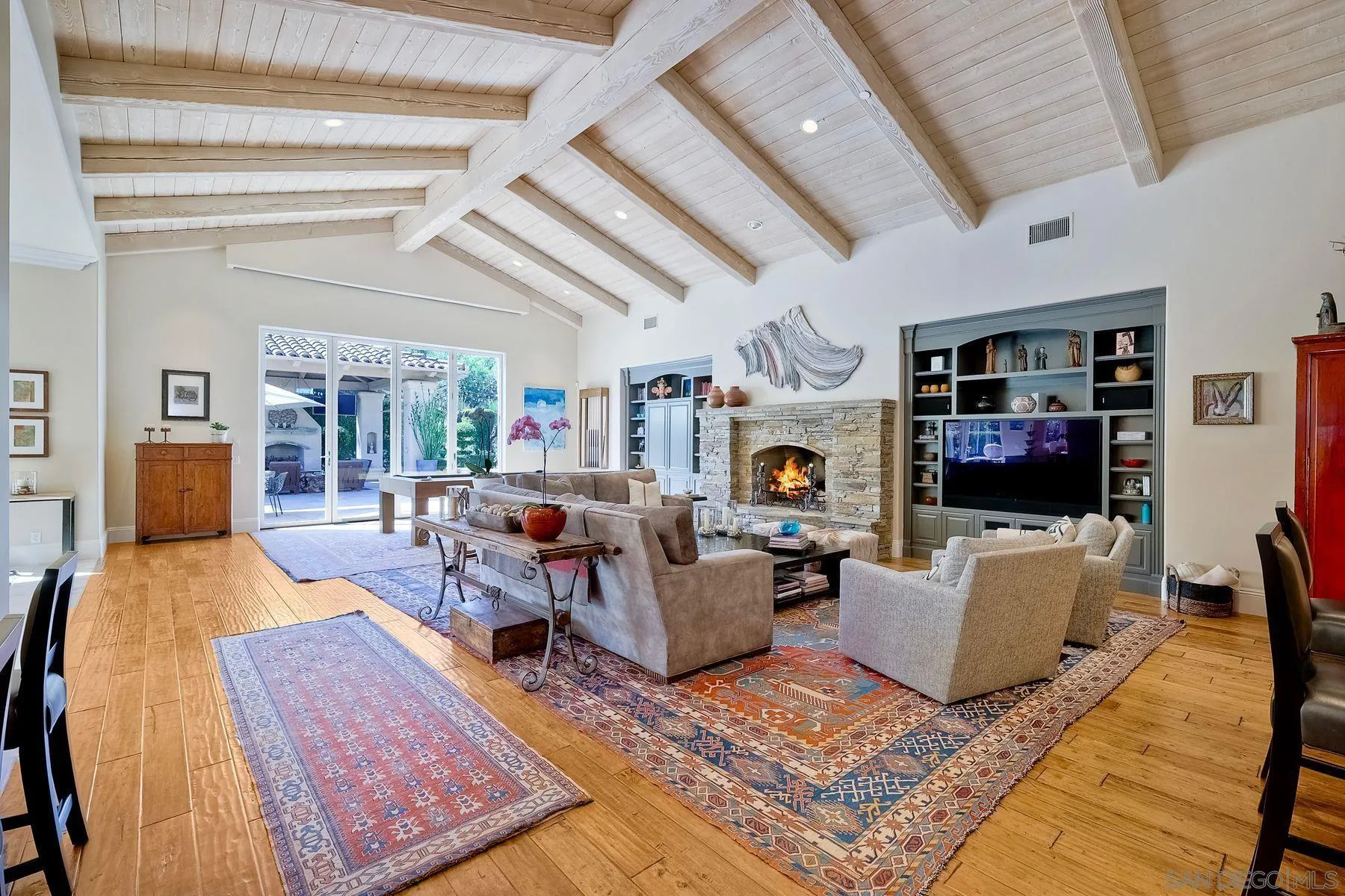 17732 Vineyard Lane Poway, CA 92064 - Photo 8 of 63 a living room with furniture and a flat screen tv