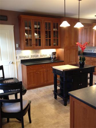 5 Crescent Hill Wakefield, MA 01880 - Photo 4 of 24 a room with a table chairs and a kitchen view