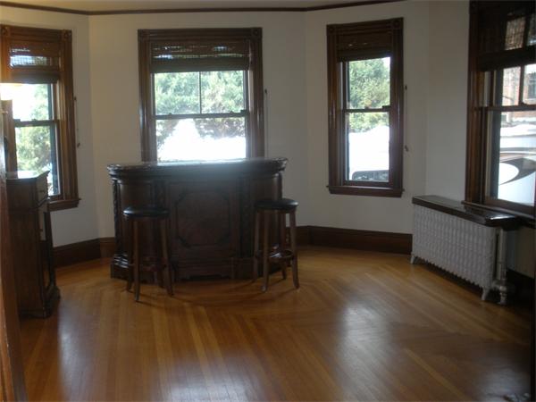 5 Crescent Hill Wakefield, MA 01880 - Photo 7 of 24 an empty room with wooden floor and windows