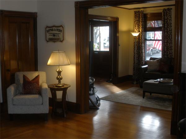 5 Crescent Hill Wakefield, MA 01880 - Photo 8 of 24 a living room with furniture and a lamp