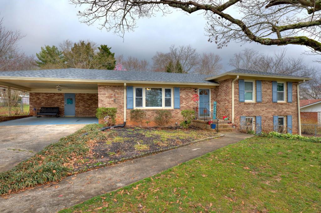 209 East John Hand Road Cedartown, GA 30125 - Photo 1 of 1 Front of home showing carport space and entry