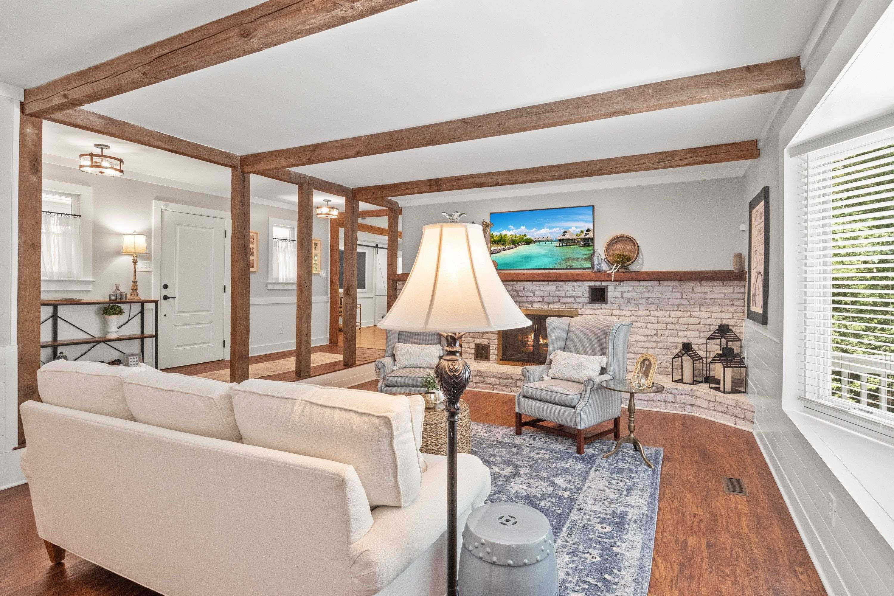 2420 Windsor Trail Raleigh, NC 27615 - Photo 11 of 72 a living room with furniture and a large window