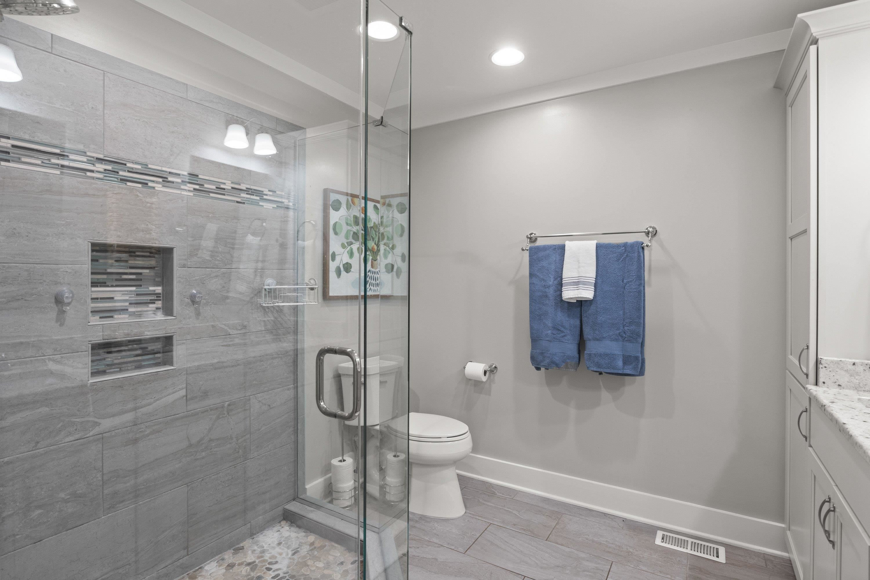 2420 Windsor Trail Raleigh, NC 27615 - Photo 32 of 72 a bathroom with a shower a toilet and sink