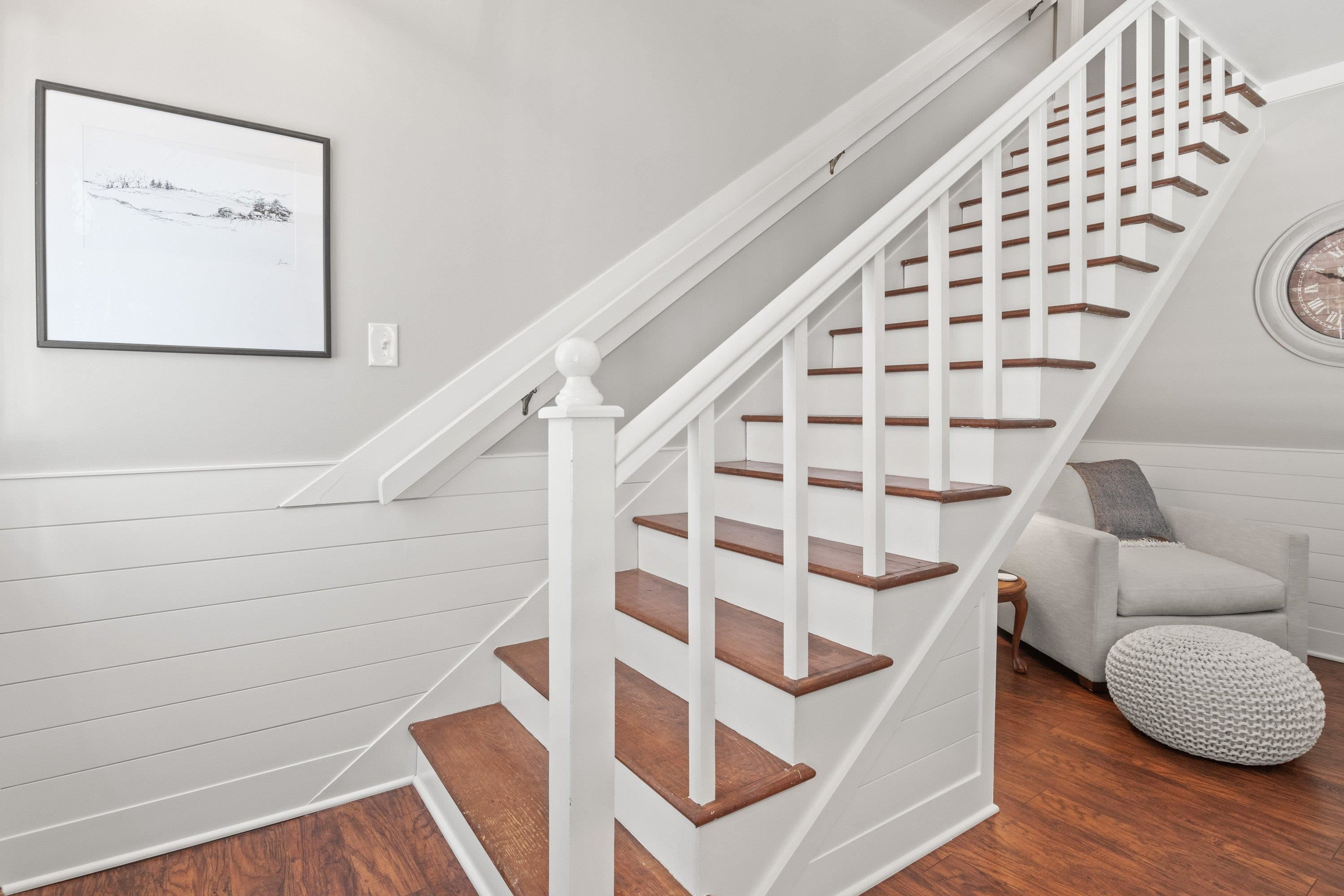 2420 Windsor Trail Raleigh, NC 27615 - Photo 41 of 72 a view of staircase with wooden floor and white walls