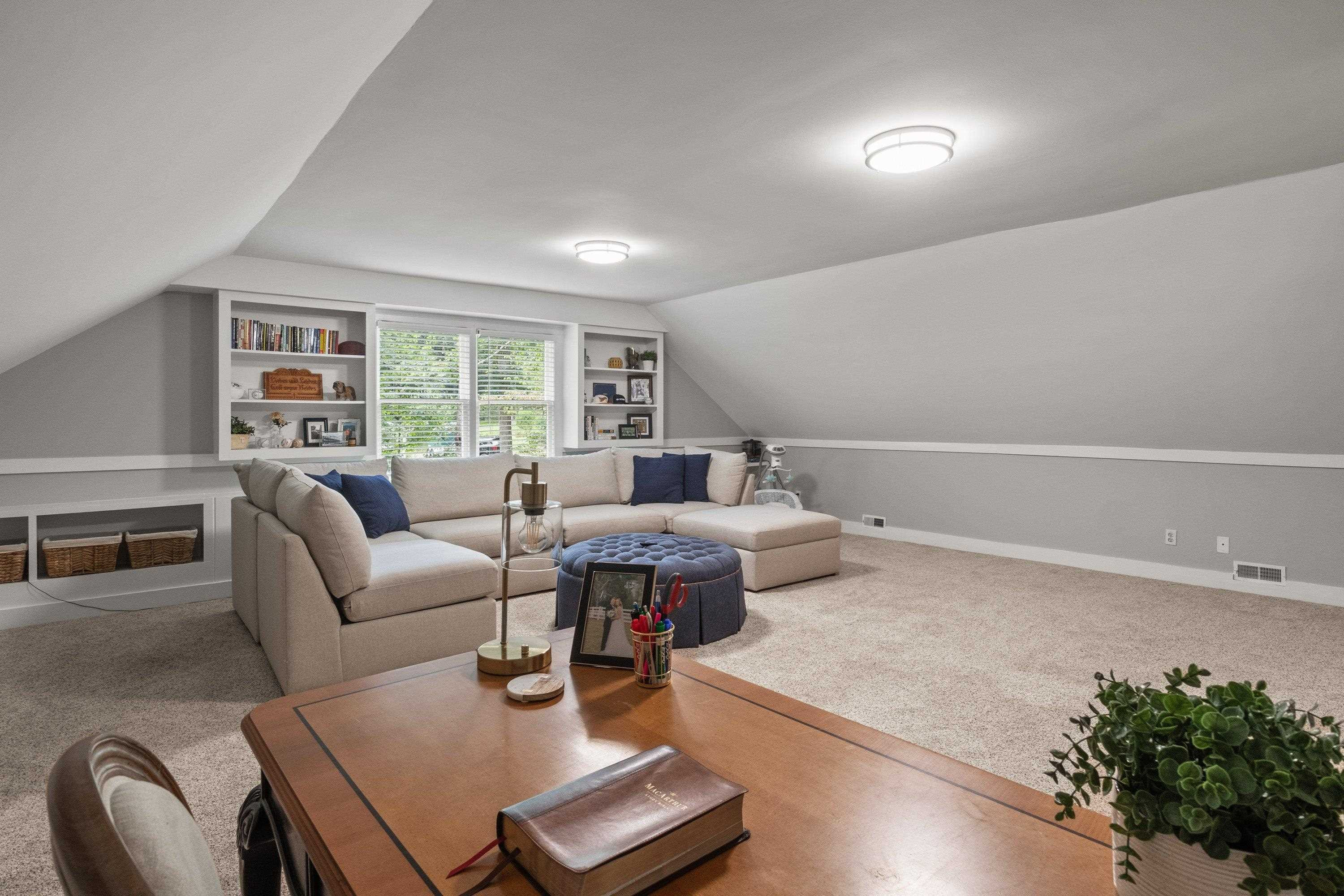 2420 Windsor Trail Raleigh, NC 27615 - Photo 43 of 72 a living room with furniture and a large window