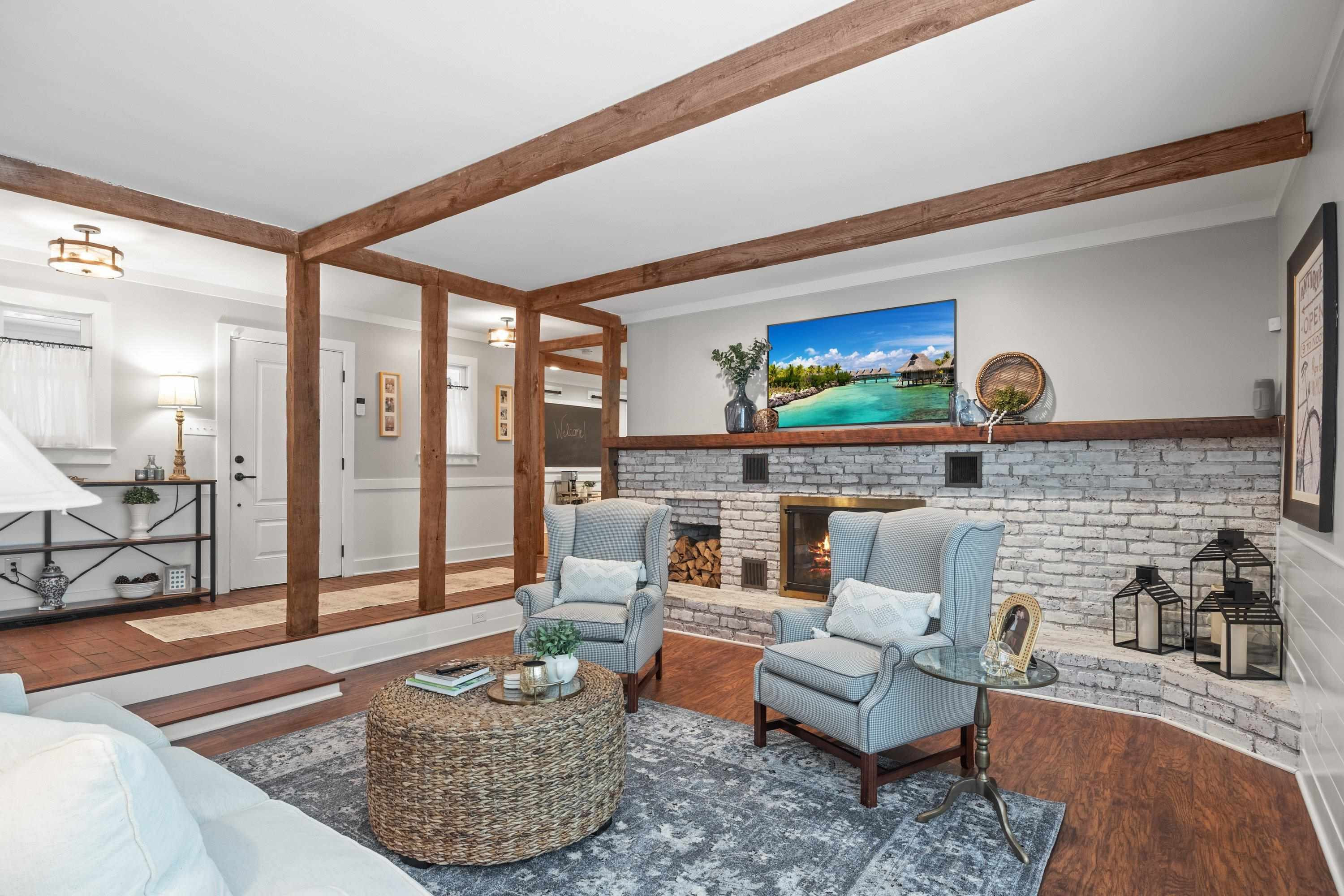 2420 Windsor Trail Raleigh, NC 27615 - Photo 5 of 72 a living room with furniture a rug and a large window