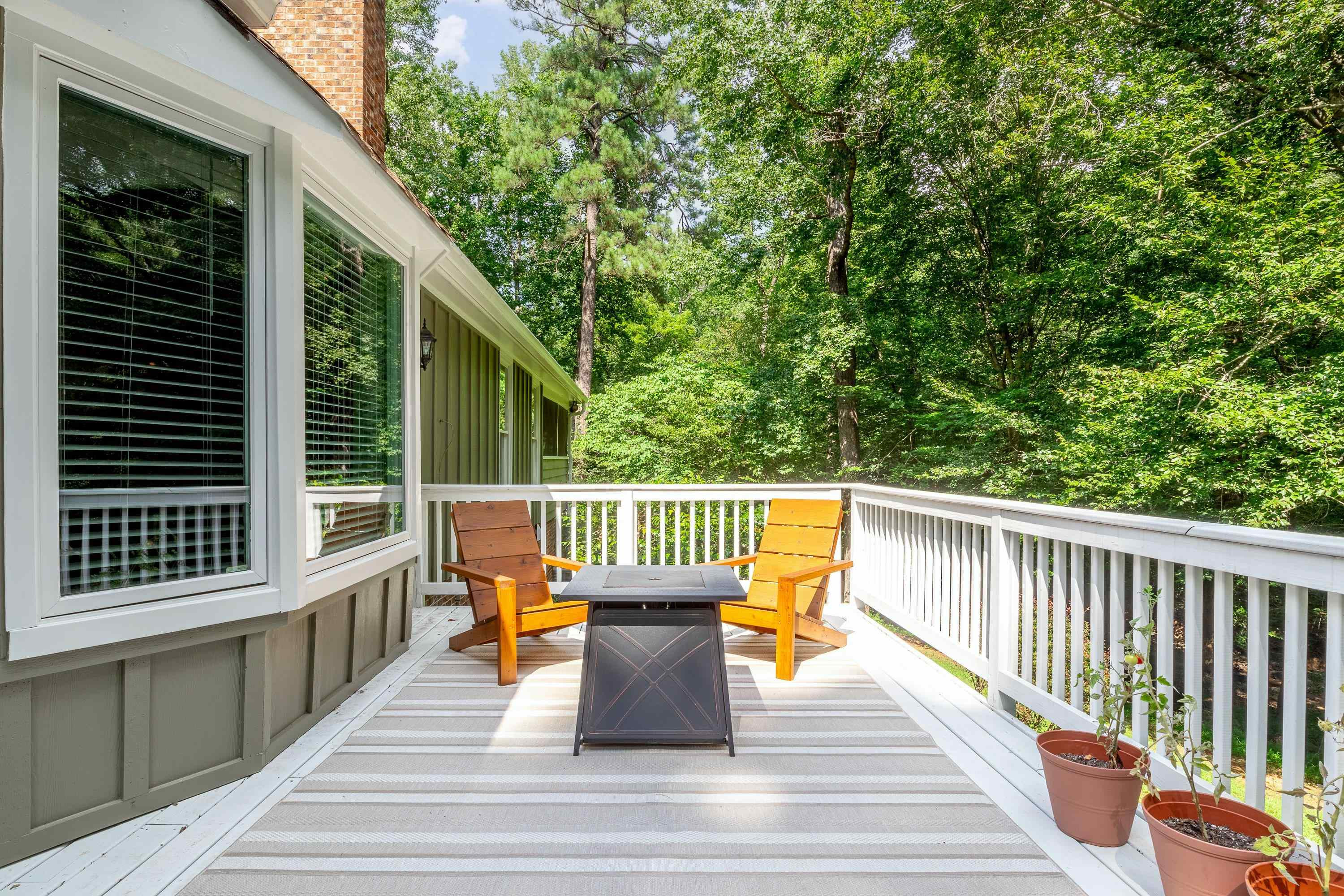 2420 Windsor Trail Raleigh, NC 27615 - Photo 55 of 72 a view of a chair and table on the balcony