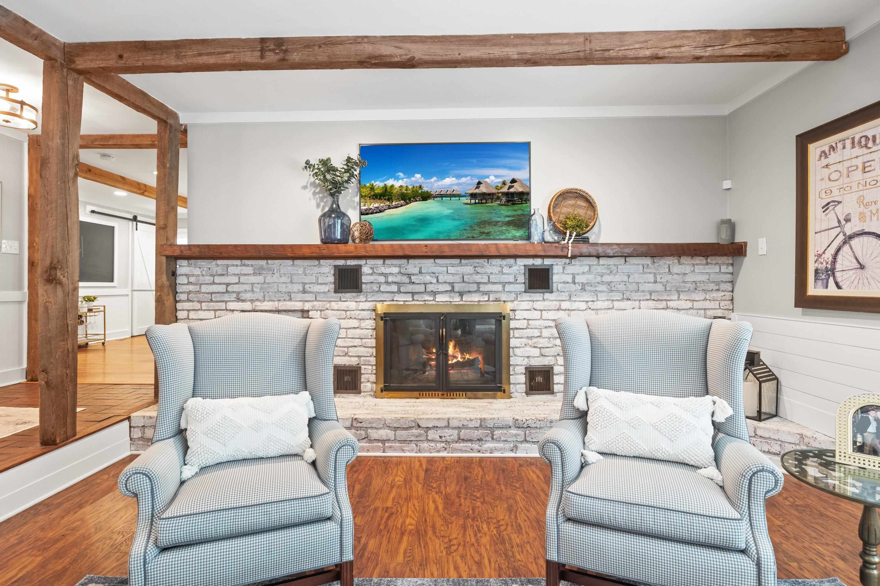 2420 Windsor Trail Raleigh, NC 27615 - Photo 6 of 72 a living room with furniture and a fireplace
