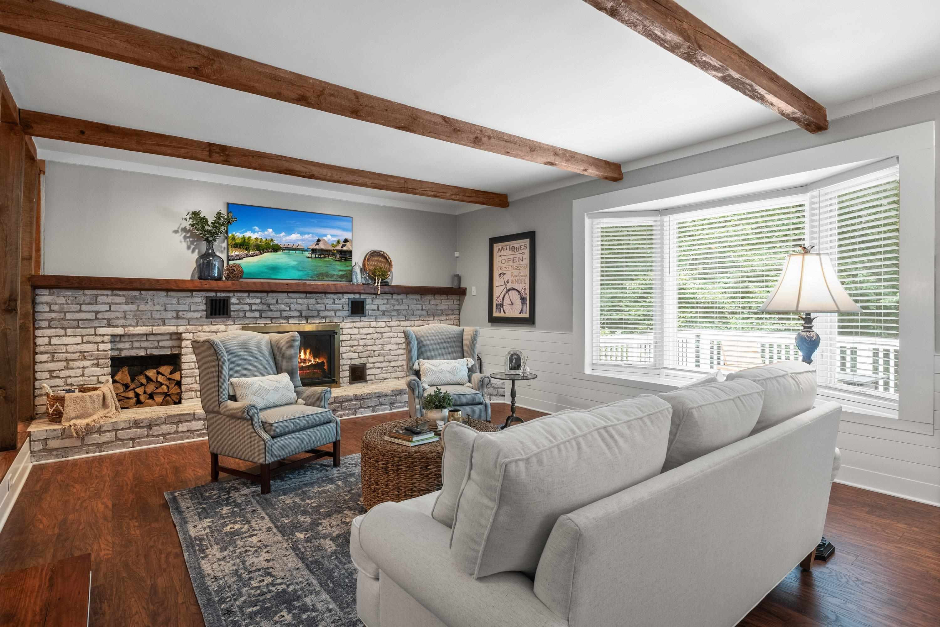 2420 Windsor Trail Raleigh, NC 27615 - Photo 7 of 72 a living room with furniture and a fireplace