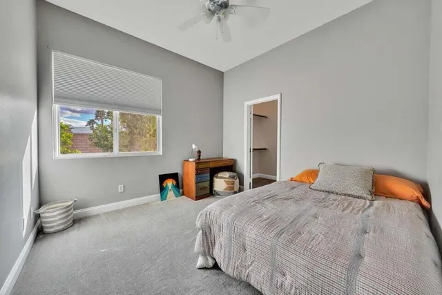 a bathroom with a double vanity sink mirror and shower