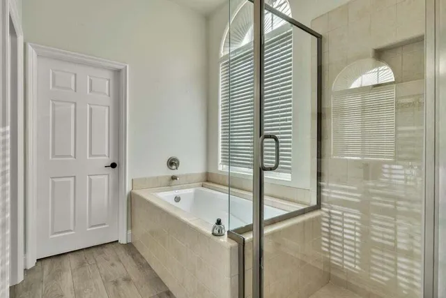 a utility room with sink dryer and washer