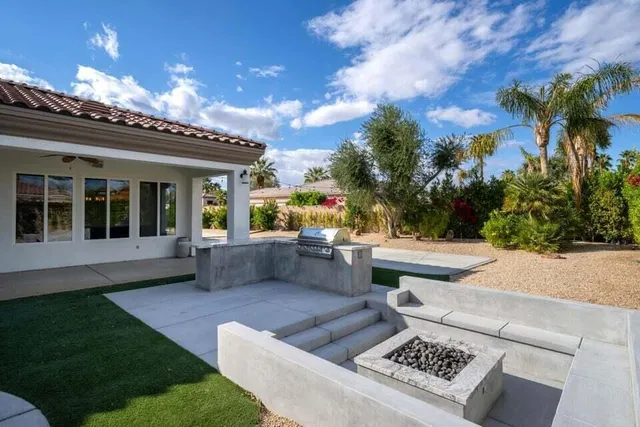 a view of outdoor space with seating area