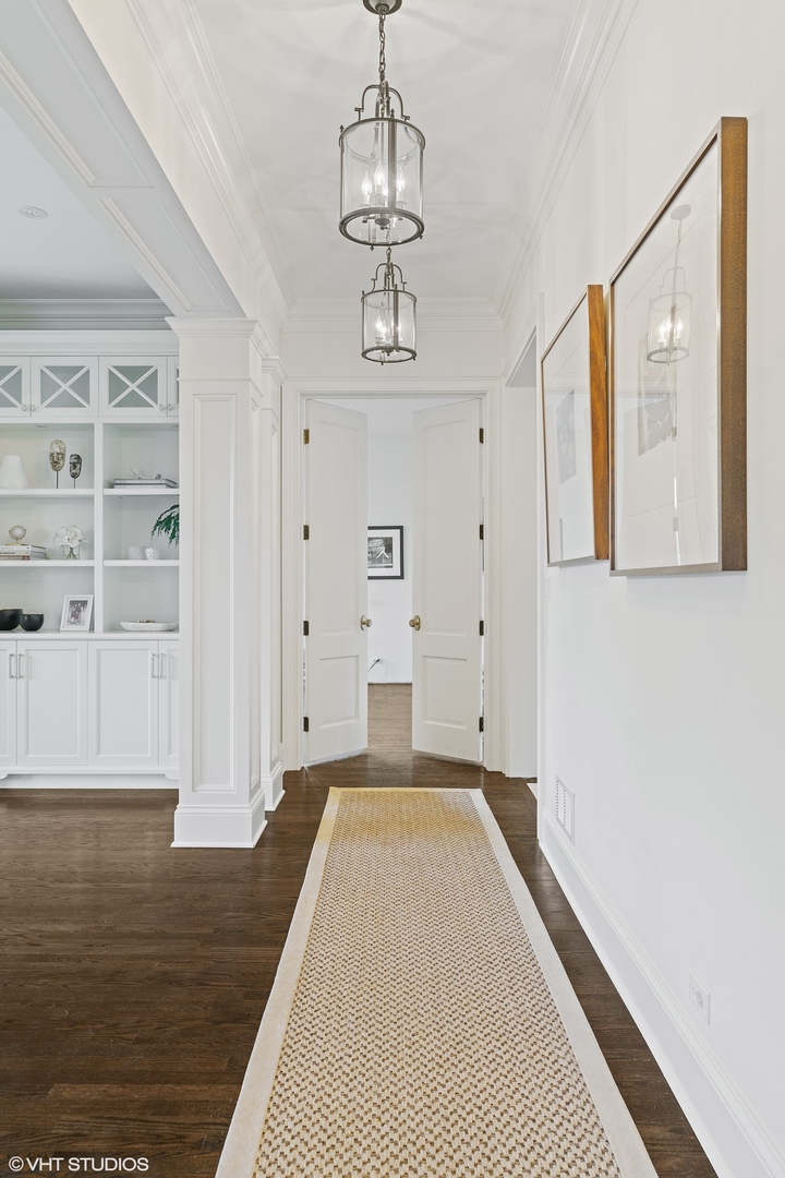 345 West Onwentsia Road Lake Forest, IL 60045 - Photo 16 of 53 a view of a livingroom with wooden floor and windows