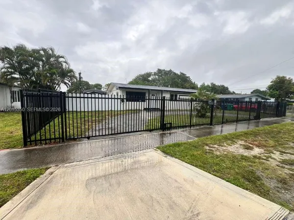 a view of a backyard with a garden